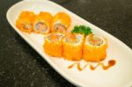 Smoked Salmon Sushi Roll On Plate Stock Photo