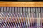 Detail Of Fabric In Comb Loom With Ultraviolet And Lilac Colors Stock Photo