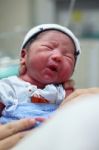 Newborn Baby With Red Body Stock Photo