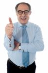 Businessman Showing Thumbs Up Stock Photo