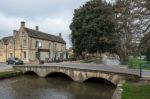 Tourists Wandering Around Bourton-on-the-water Stock Photo