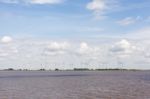 Wind Turbines Near River Stock Photo