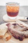 Pork Steak On Wooden Plate Stock Photo