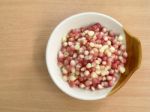 Corn In Ceramic Bowl On Wood Table Top View Stock Photo