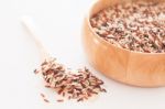 Organic Dry Multi Grain Rice In Wooden Bowl Stock Photo