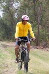 Man And Mountain Bike Riding In Jungle Track Use For Bicycle Sport Outdoor And Extreme Activities Stock Photo