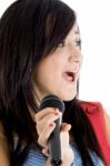 Young Girl With Microphone Stock Photo