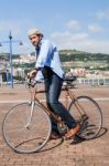 Modern Man Riding A Urban Bike Stock Photo