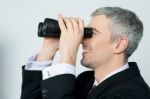 Young Business Man With Binocular Stock Photo