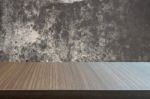 Top Of Wood Table On Old Concrete Wall Background Stock Photo