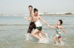 Family  In The Beach Stock Photo