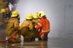 Fireman. Firefighters Fighting Fire During Training Stock Photo