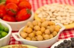 Variety Of Kitchen Ingredients With Fresh And Dried Legumes Stock Photo