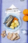 Mackerel Fish With Potato And Carrot Stock Photo