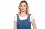 Smiling Lovely Lady In Denims Stock Photo