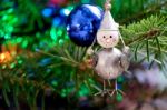 Toy Bird On A Christmas Tree Stock Photo