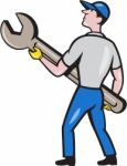 Mechanic Carrying Giant Spanner Cartoon Stock Photo