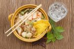 Asian Cuisine , Pork Noodle In The Bowl With Herb Stock Photo