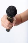 Woman Hand With Microphone Stock Photo