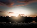 Scenery Of Wooden Pier With Dramatic Sky Stock Photo