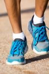 Man In Sportswear Running In A Park Stock Photo