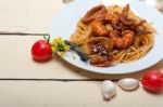 Italian Seafood Spaghetti Pasta On Red Tomato Sauce Stock Photo