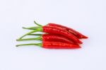 Red Chili Pepper On A White Background Stock Photo