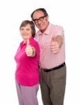 Senior Couple Gesturing Thumbs Up Stock Photo