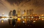 Bangkok In Evening, Reflection Of Buildings In Water Stock Photo