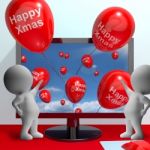 Red Balloons With Happy Xmas For Online Greetings Stock Photo