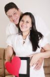 Pregnant Women With Her Husband Waiting For Her Baby Stock Photo