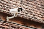 Cctv On Old Roof Stock Photo