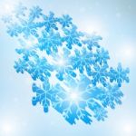 Winter Blue Sky With Falling Snow Stock Photo