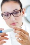 Doctor Nurse Examining Thermometer Stock Photo