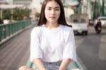 Thai Adult Girl White T-shirt Beautiful Girl Relax And Smile Stock Photo