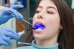 Young Woman At The Dental Office Stock Photo