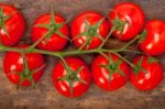 Fresh Cherry Tomatoes On A Cluster Stock Photo