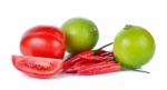 Lime, Tomato, Chilli Isolated On White Background Stock Photo