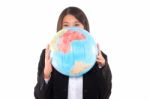 Asian Businesswoman With Globe Stock Photo