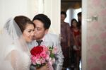 Groom Kissing To Bride Stock Photo