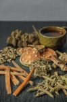 Dried Herbs And Ginseng, Top View Of Thai Herbs And Ginseng On Wooden Floor Stock Photo