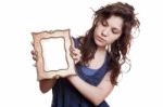 Woman Holding An Picture Frame Stock Photo