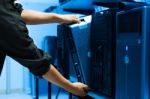 Man Fix Server Network In Data Center Room Stock Photo