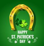 Gold Horseshoe With Shamrock For St. Patrick's Day Stock Photo