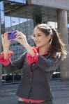 Woman Photographing With Mobile Phone Stock Photo