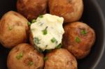 Baked Potato Butter Herb Tasty Closeup Stock Photo