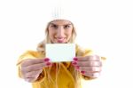 Smiling Woman Showing Business Card Stock Photo