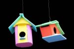 Colorful Bird House Isolated On Black Background Stock Photo