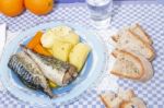 Mackerel Fish With Potato And Carrot Stock Photo