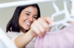 Two Beautiful Girls Shopping In A Clothes Shop Stock Photo